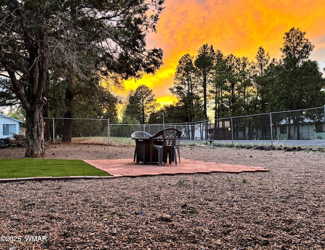 view of property's community featuring fence