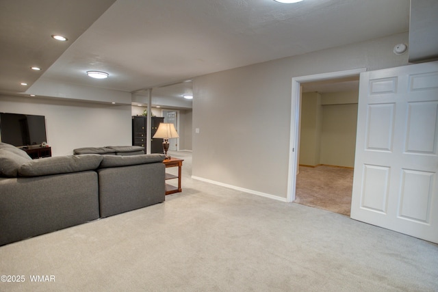carpeted living room with baseboards and recessed lighting