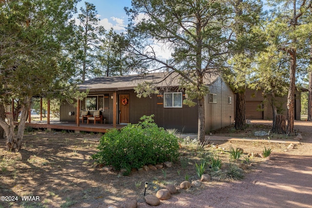 view of front of property with a deck