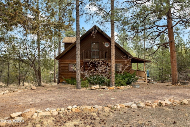 exterior space featuring log siding