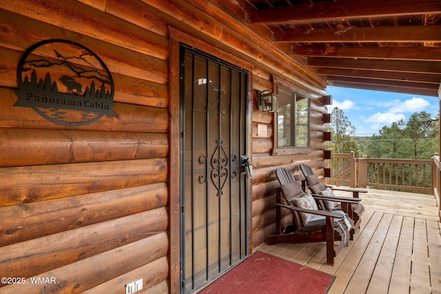 entrance to property featuring covered porch