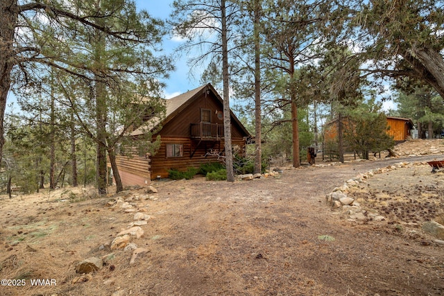 exterior space featuring log siding