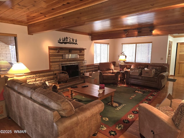 2761 Blue Lupine Ln, Pinetop, AZ 85935 - living room featuring wood finished floors, wood ceiling, and a stone fireplace