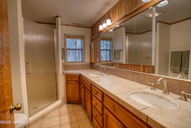 2761 Blue Lupine Ln, Pinetop, AZ 85935 - full bathroom with tile patterned floors, a sink, toilet, and a shower stall