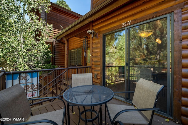 balcony with outdoor dining area