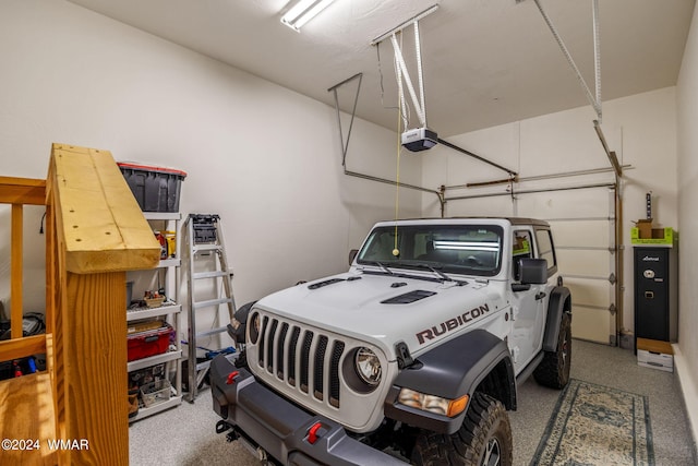 garage featuring a garage door opener
