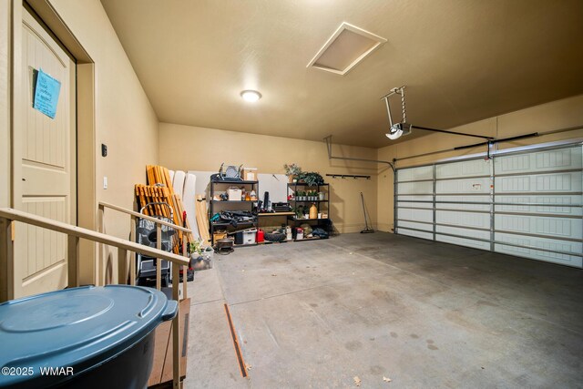 garage featuring a garage door opener
