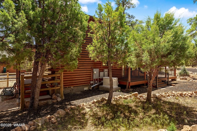 1464 Low Mountain Trl, Heber, AZ 85928 - view of side of home featuring a deck and crawl space