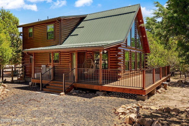 1464 Low Mountain Trl, Heber, AZ 85928 - view of front of home featuring metal roof, log exterior, and a wooden deck