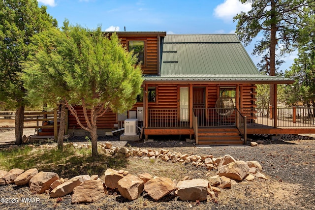 1464 Low Mountain Trl, Heber, AZ 85928 - view of front of property featuring log siding, metal roof, and a porch