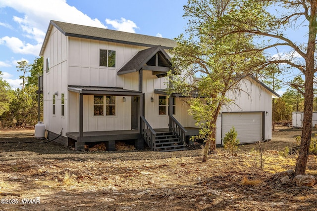 modern farmhouse style home with a garage, a shingled roof, and board and batten siding