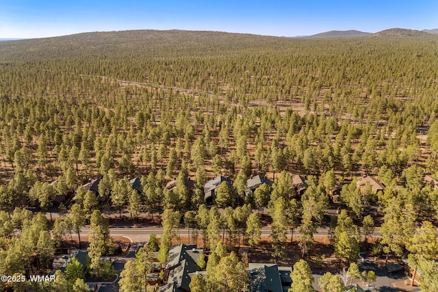 4186 Stone Pine Dr, Pinetop, AZ 85935 - aerial overview of property's location featuring a heavily wooded area and a mountainous background
