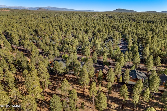 4186 Stone Pine Dr, Pinetop, AZ 85935 - aerial view of a heavily wooded area and a mountainous background