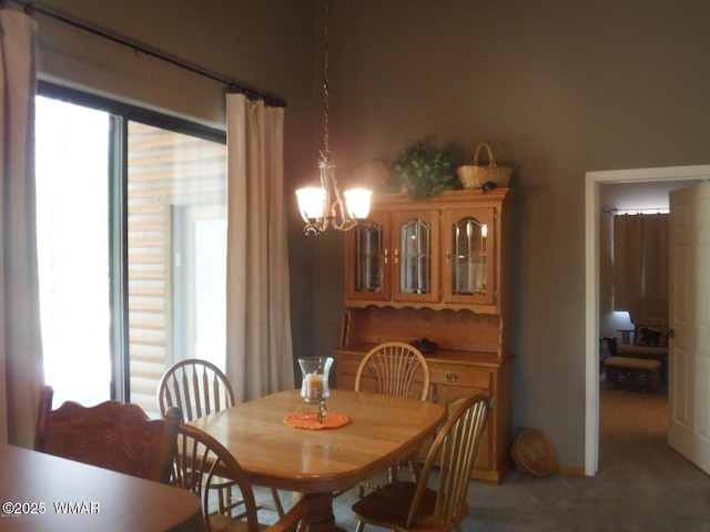 dining area featuring a chandelier