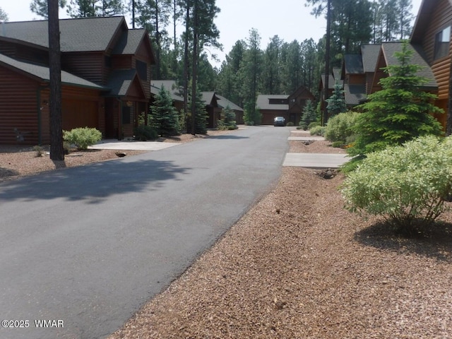 view of road with a residential view