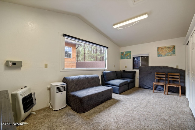 1720 W Huning, Show Low, AZ 85901 - living area featuring heating unit, vaulted ceiling, and carpet flooring