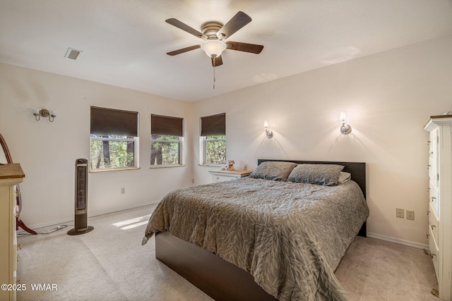 1720 W Huning, Show Low, AZ 85901 - bedroom with light colored carpet and ceiling fan