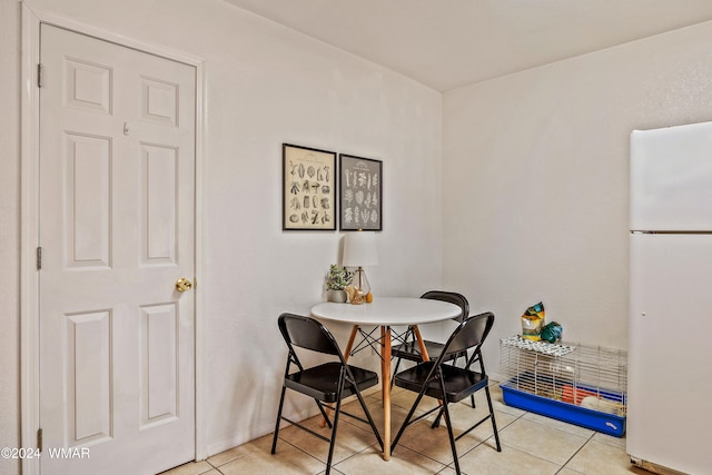 55 E Central Ave, Eagar, AZ 85925 - dining area featuring light tile patterned floors