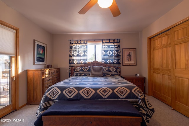 bedroom with light carpet, a closet, and ceiling fan