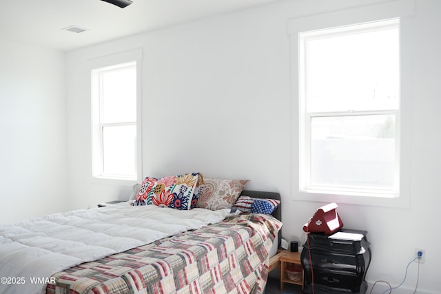 bedroom with visible vents