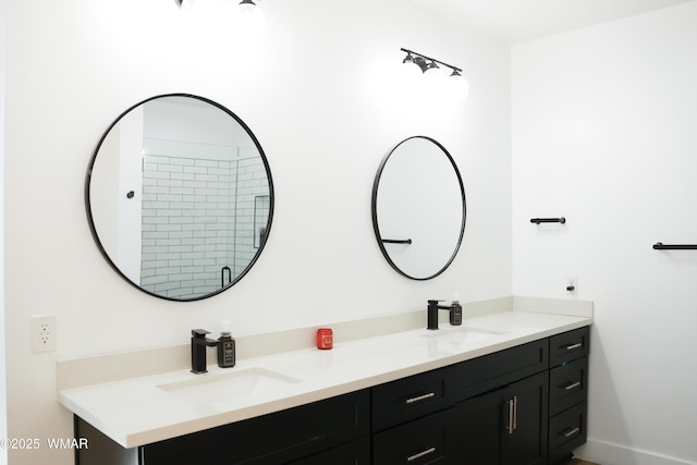 bathroom with double vanity and a sink