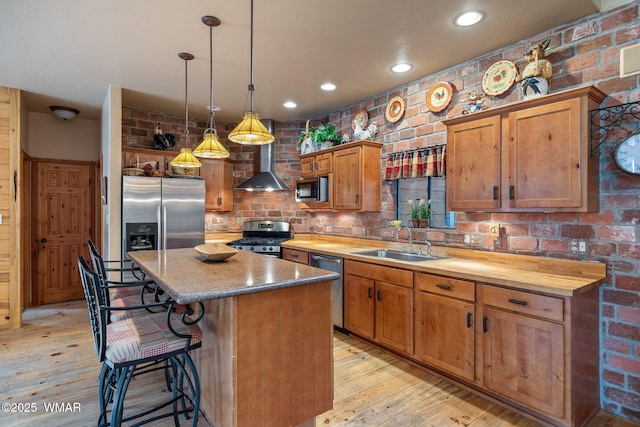 2353 Florian Meadow Trl, Overgaard, AZ 85933 - kitchen with stainless steel appliances, butcher block counters, light wood-type flooring, a center island, and recessed lighting