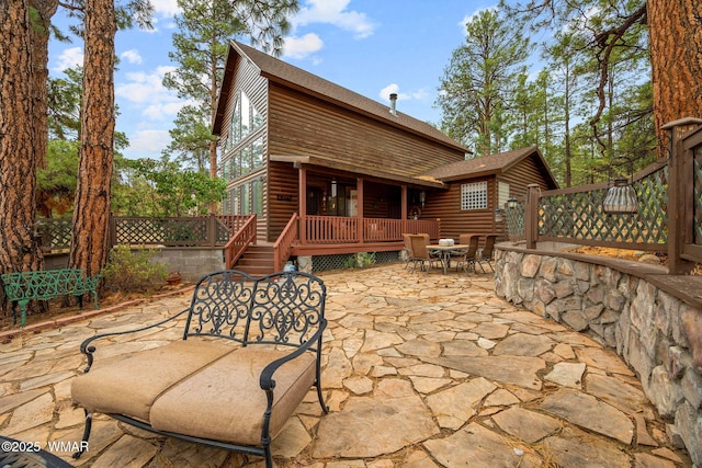 2353 Florian Meadow Trl, Overgaard, AZ 85933 - view of patio featuring outdoor dining area and a deck