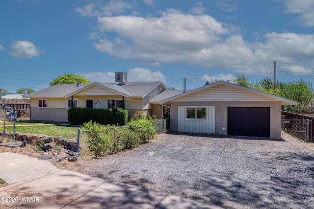 839 S 3rd St, Snowflake, AZ 85937 - ranch-style house with an attached garage, gravel driveway, and central AC unit