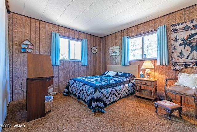 978 Timberland Rd, Show Low, AZ 85901 - carpeted bedroom with wood walls