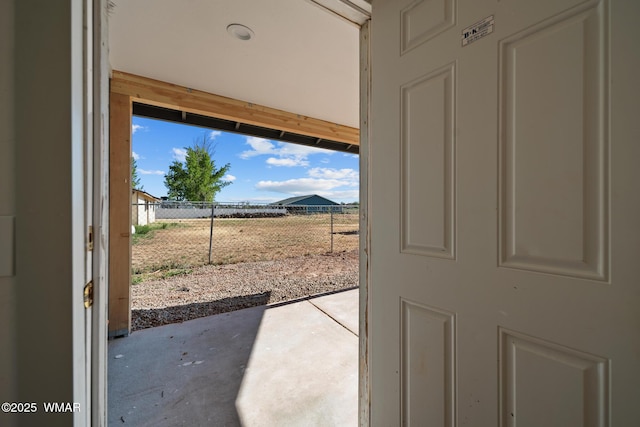 202 700th St W, Taylor, AZ 85939 - doorway to outside featuring concrete flooring