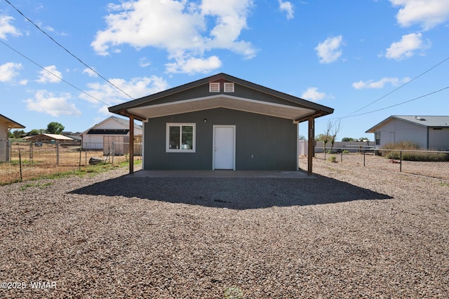 202 700th St W, Taylor, AZ 85939 - rear view of property with a patio area and a fenced backyard