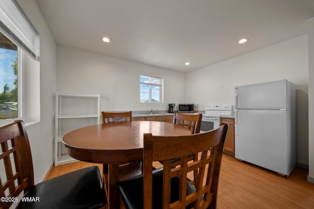 202 700th St W, Taylor, AZ 85939 - dining space with light wood-style flooring and recessed lighting