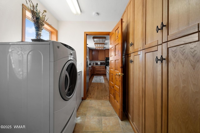 746 Jacks Wild Rd, Show Low, AZ 85901 - clothes washing area featuring cabinet space and washer and dryer