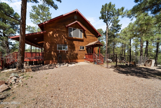746 Jacks Wild Rd, Show Low, AZ 85901 - back of house with fence and a wooden deck
