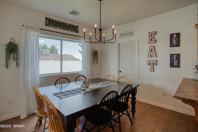 545 S 7th St, Snowflake, AZ 85937 - dining room with a chandelier and tile patterned floors