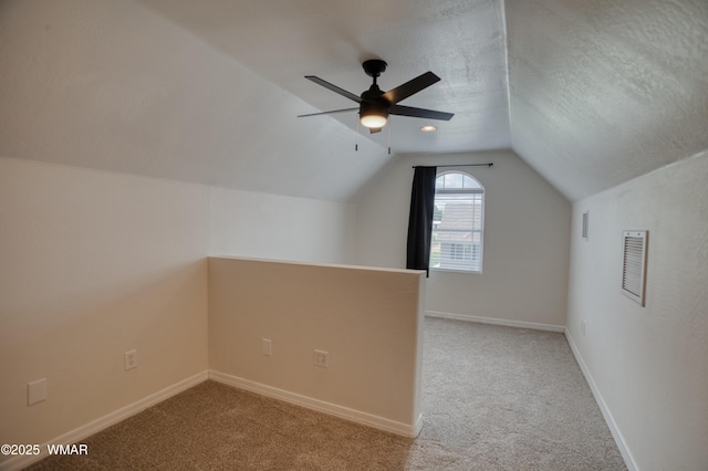 545 S 7th St, Snowflake, AZ 85937 - additional living space with carpet flooring, vaulted ceiling, and a ceiling fan