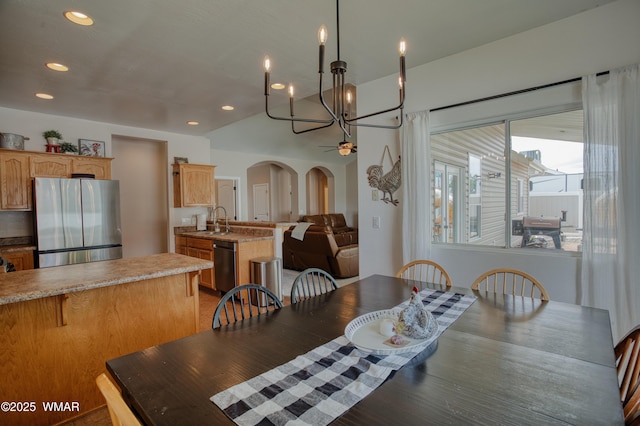 545 S 7th St, Snowflake, AZ 85937 - dining space with arched walkways, ceiling fan, recessed lighting, and a chandelier