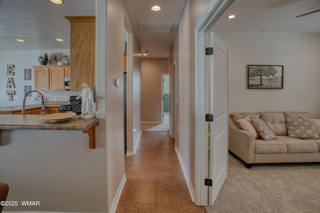 545 S 7th St, Snowflake, AZ 85937 - hall with recessed lighting, attic access, and light tile patterned flooring