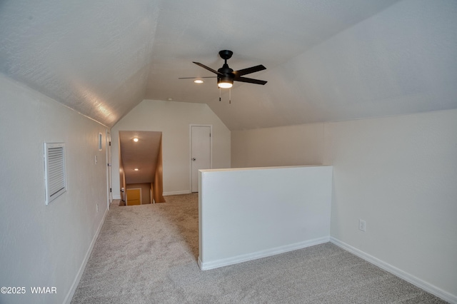 545 S 7th St, Snowflake, AZ 85937 - additional living space with vaulted ceiling, carpet, and a ceiling fan