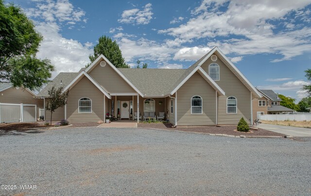 545 S 7th St, Snowflake, AZ 85937 - ranch-style home with a porch and roof with shingles