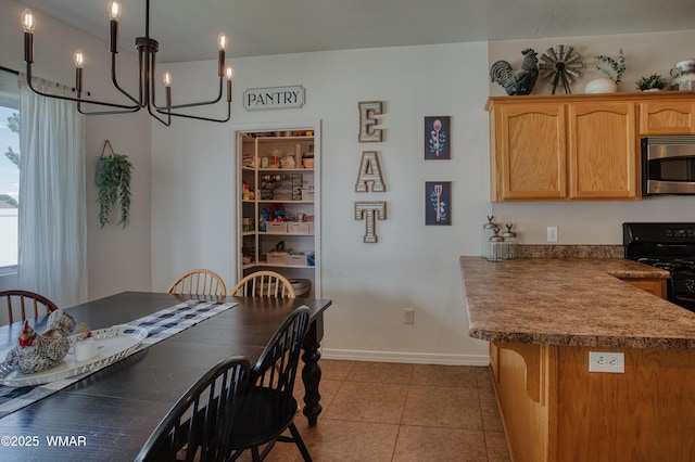 545 S 7th St, Snowflake, AZ 85937 - dining area with a chandelier and light tile patterned floors