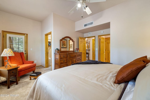 bedroom with a ceiling fan, light colored carpet, and visible vents