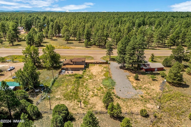 bird's eye view featuring a view of trees