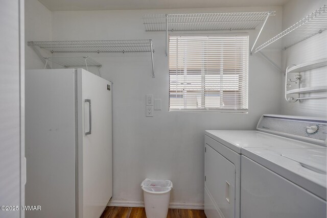 1879 Fairway Run, Show Low, AZ 85901 - laundry room with washing machine and clothes dryer and dark wood-style flooring