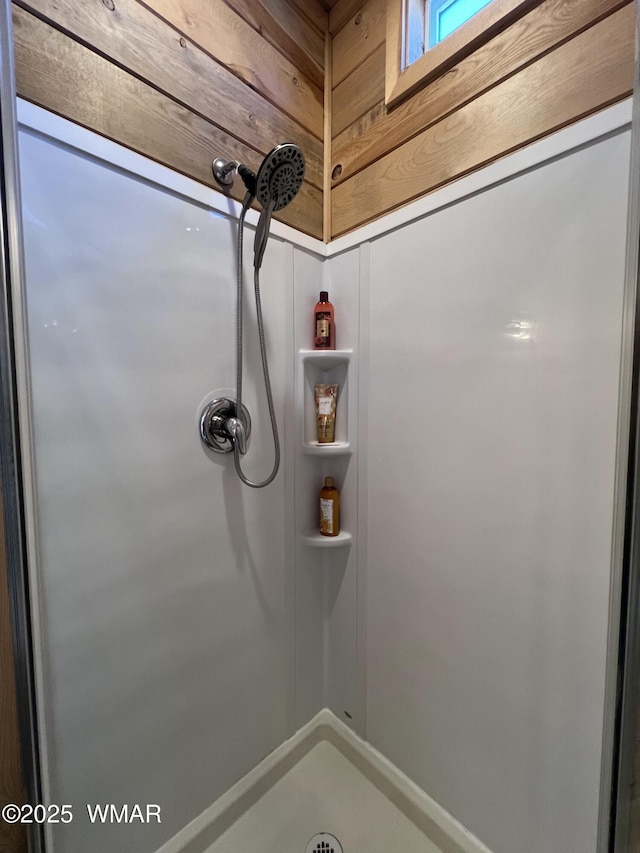 full bathroom featuring a shower stall