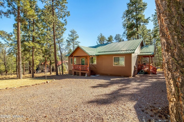 rustic home with metal roof