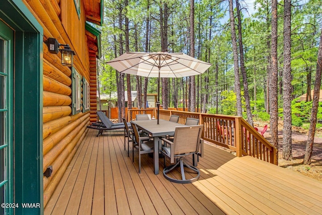 6436 Mark Twain Dr, Pinetop, AZ 85935 - wooden terrace with outdoor dining area and view of scattered trees