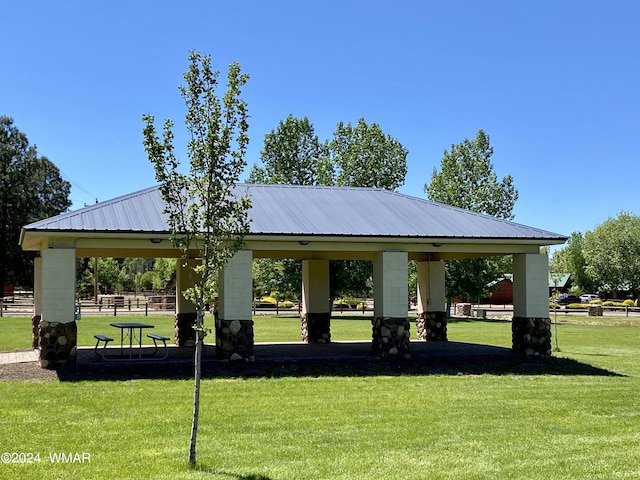 view of community with a yard and a gazebo