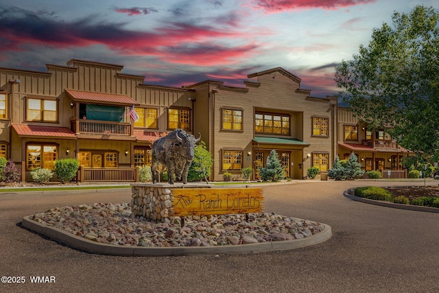 view of property at dusk