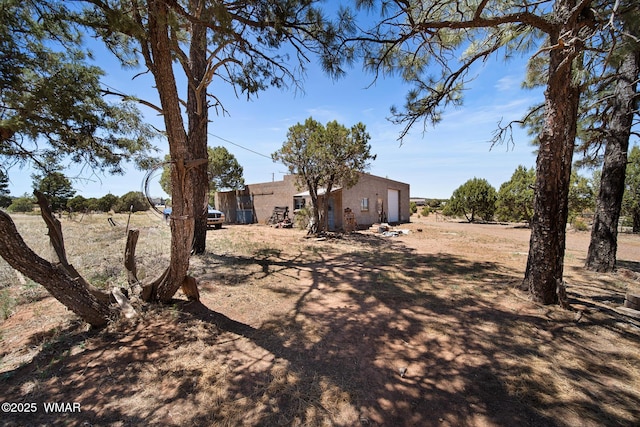 1051 Dusty Ln, Show Low, AZ 85901 - view of yard with a detached garage